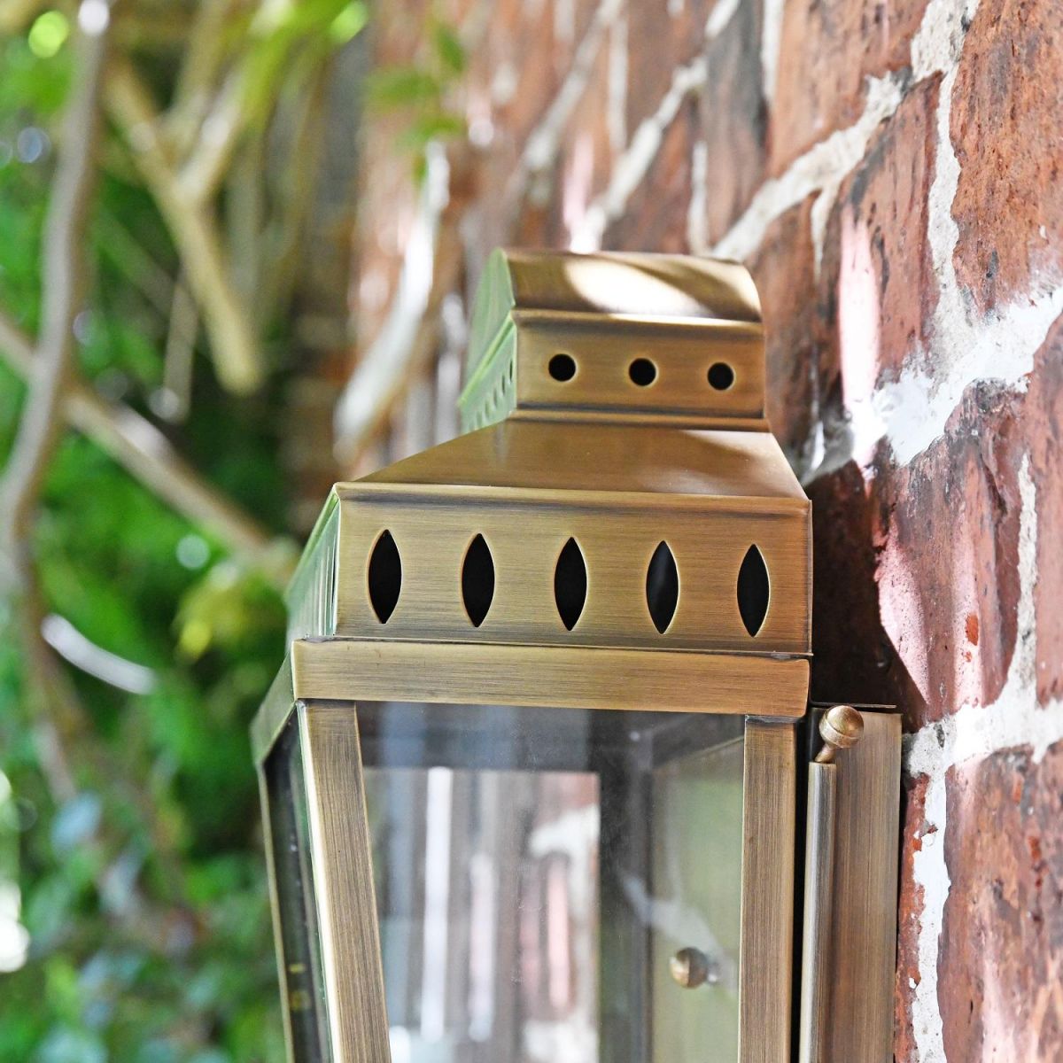Side view of antique brass wall light 