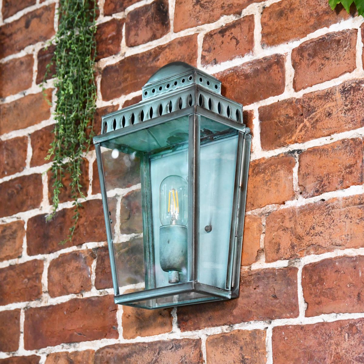 Verdigris Brass Wall Light in situ 