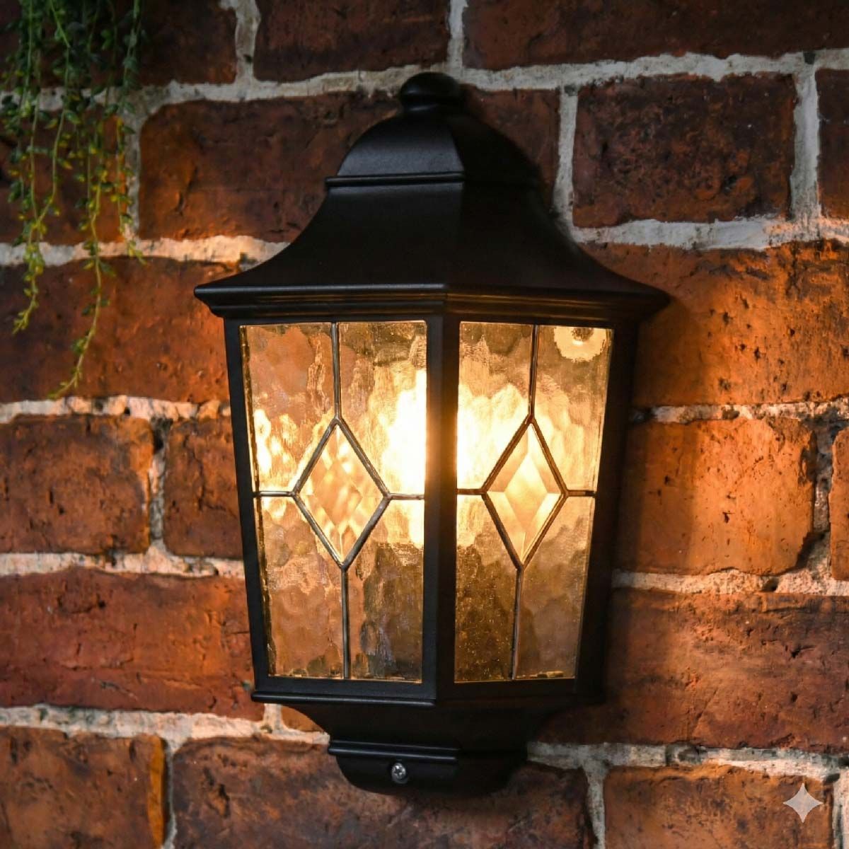 Digital illustration of illuminated "Avebury Manor" Traditional Half Lantern Wall Light in a Black Finish