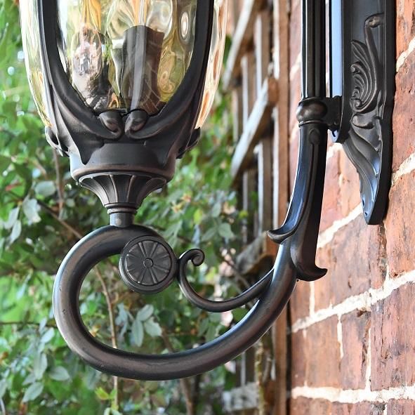 Antique Ornate Bronze Bottom-Fix Wall Lantern Scrolled Bracketry Antique Ornate Bronze Bottom-Fix Wall Lantern Scrolled Bracketry
