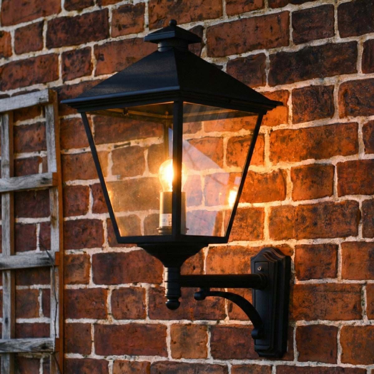 Digital illustration of illuminated "Brooksby" Large Black Simplistic Victorian Wall Lantern