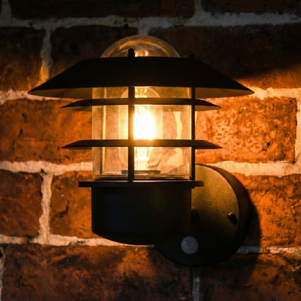 Digital illustration of illuminated "Skive" Black Contemporary Wall Light with PIR Sensor 