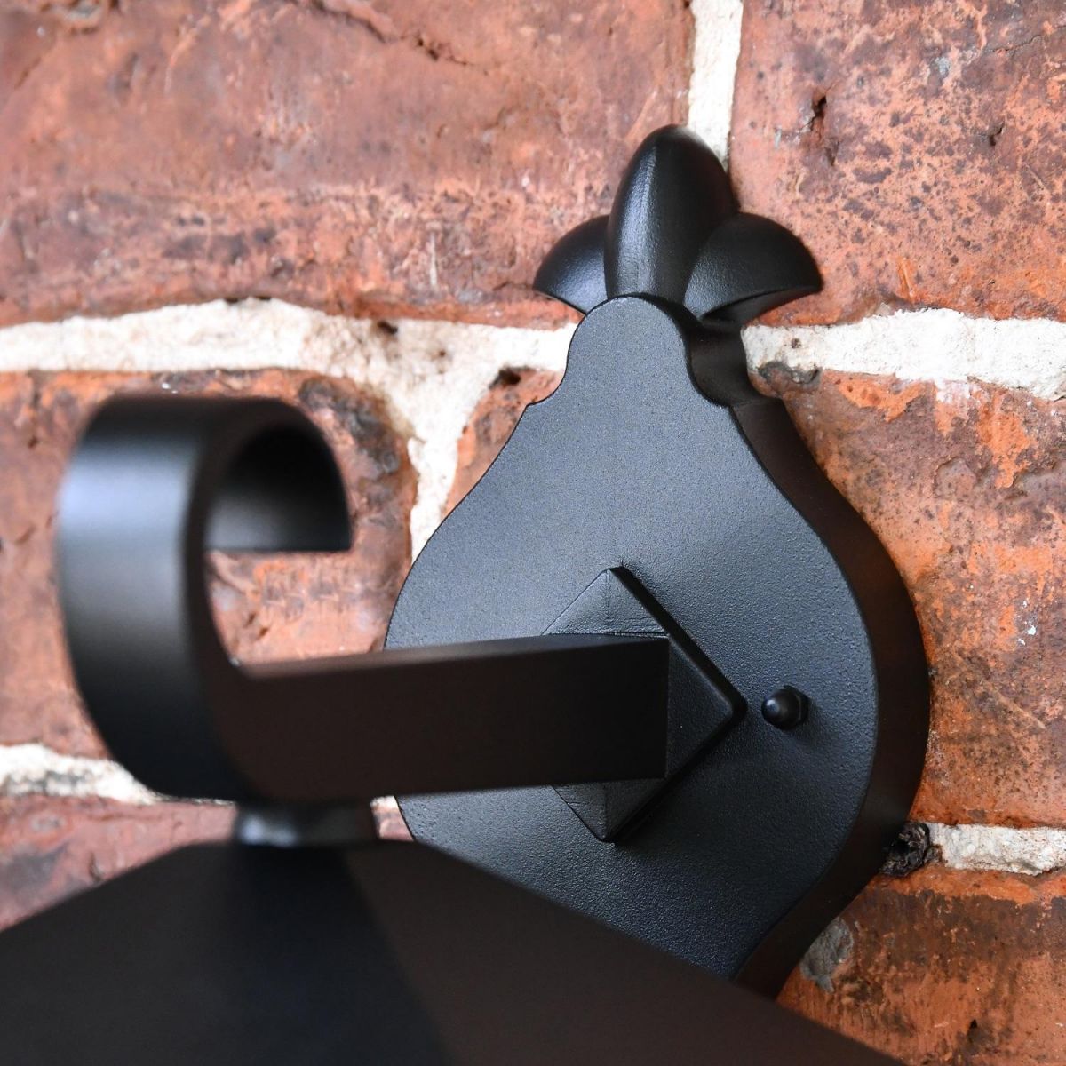 Close up of wall mounted scroll bracket Close up of wall mounted scroll bracket