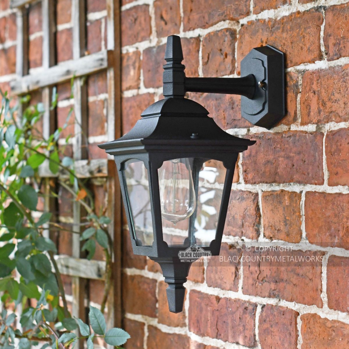 "Moorside" Traditional Top Down Black Wall Lantern in Situ on a House