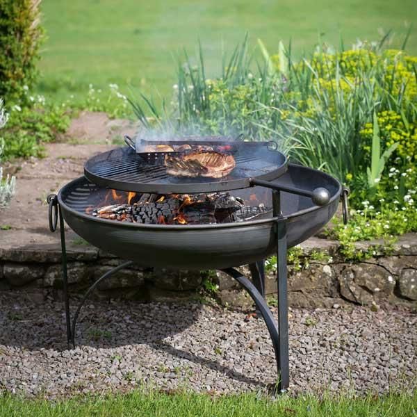 Simple Kadai Fire Bowl with Swing Arm Barbecue Rack in Situ in the Garden Simple Kadai Fire Bowl with Swing Arm Barbecue Rack in Situ in the Garden