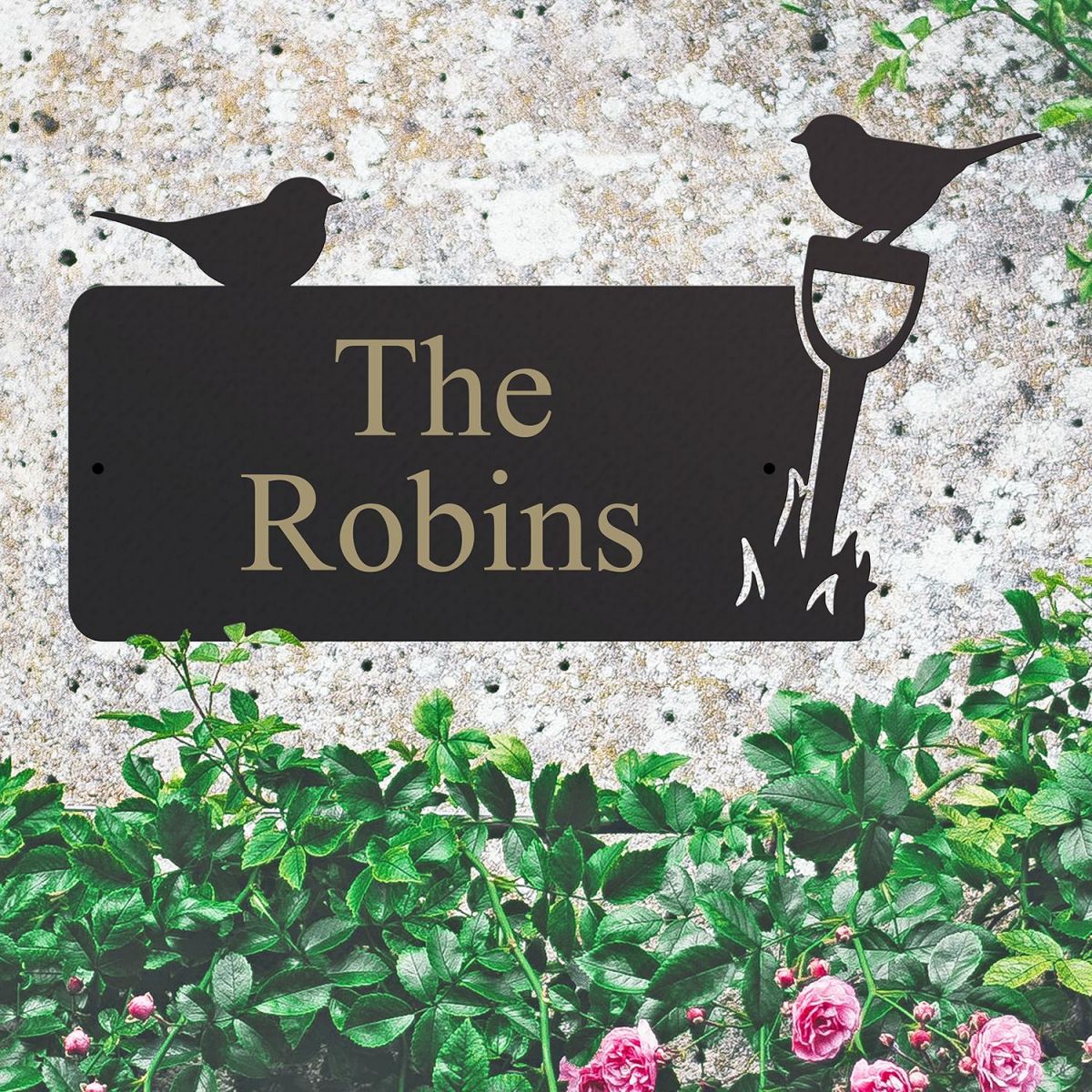 Robin Iron House Name Sign on a Stone Wall