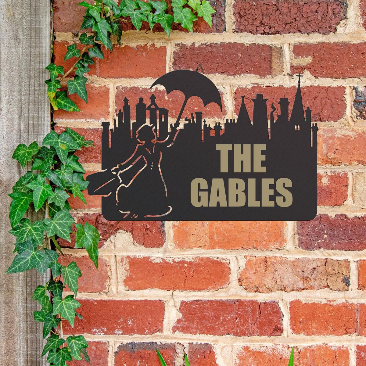 Mary Poppins Iron House Name Sign in Use on a Brick Wall