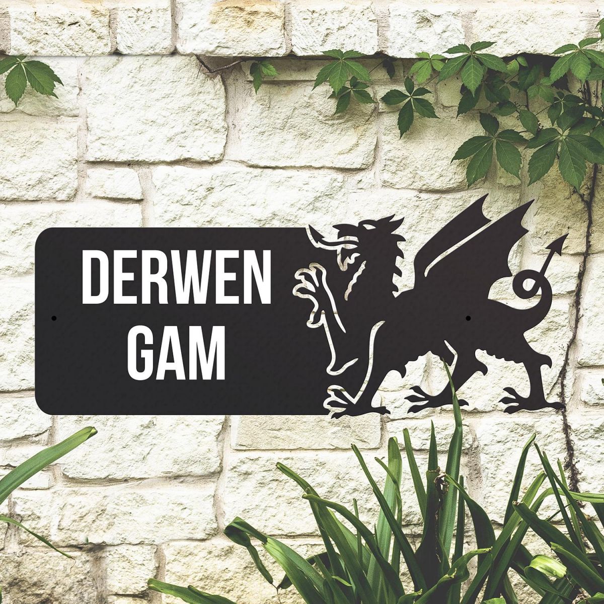 Welsh Dragon Iron House Name Sign on a Stone Wall