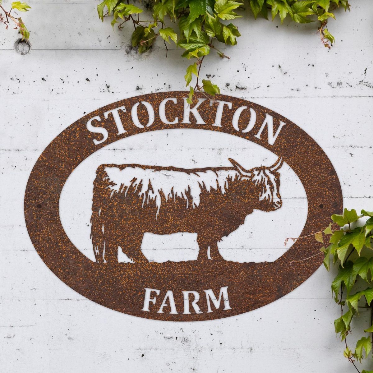 Highland Cow Iron Oval House Sign in Situ