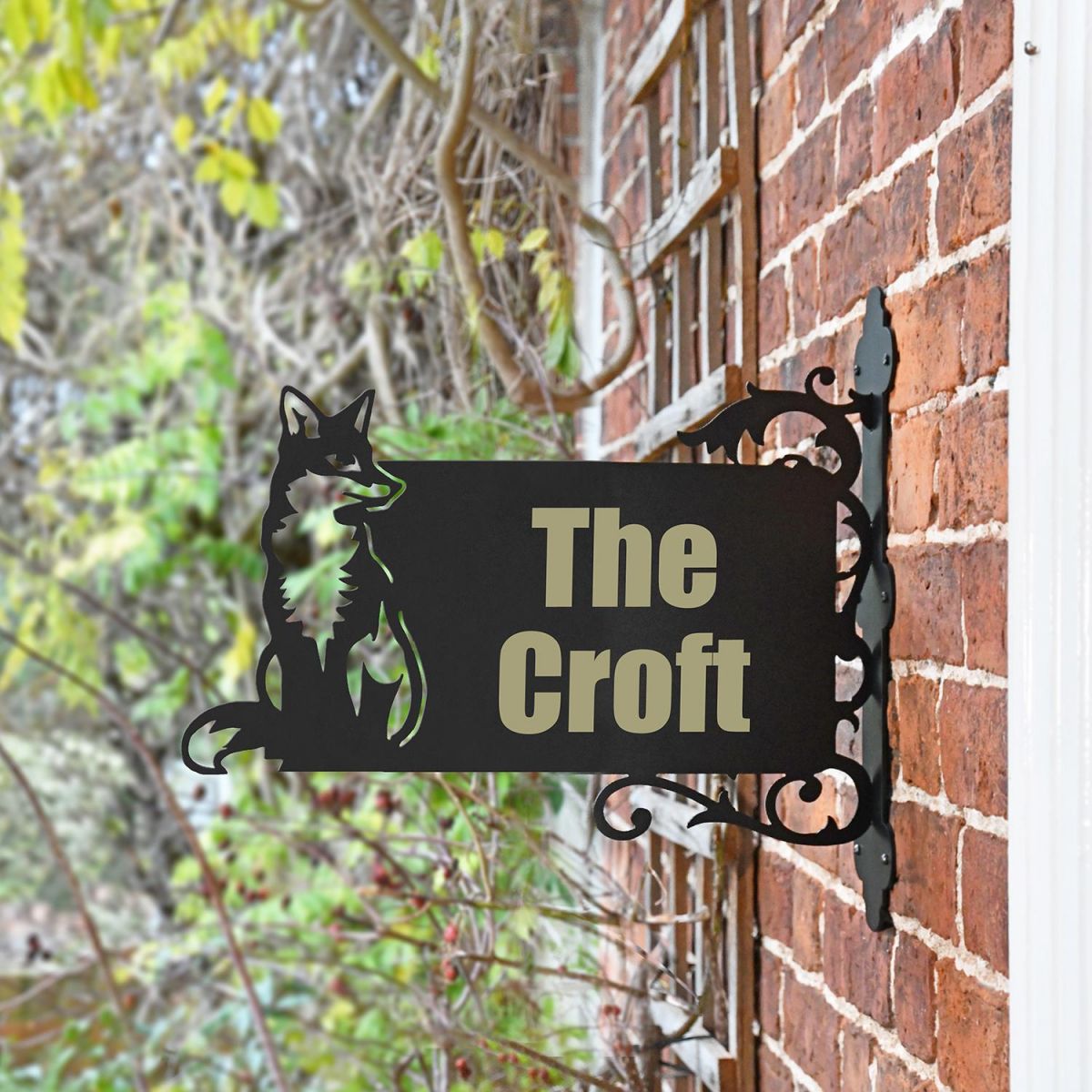 Sitting Fox Iron Bracket House Name Sign in Use on the Front of a House Sitting Fox Iron Bracket House Name Sign in Use on the Front of a House
