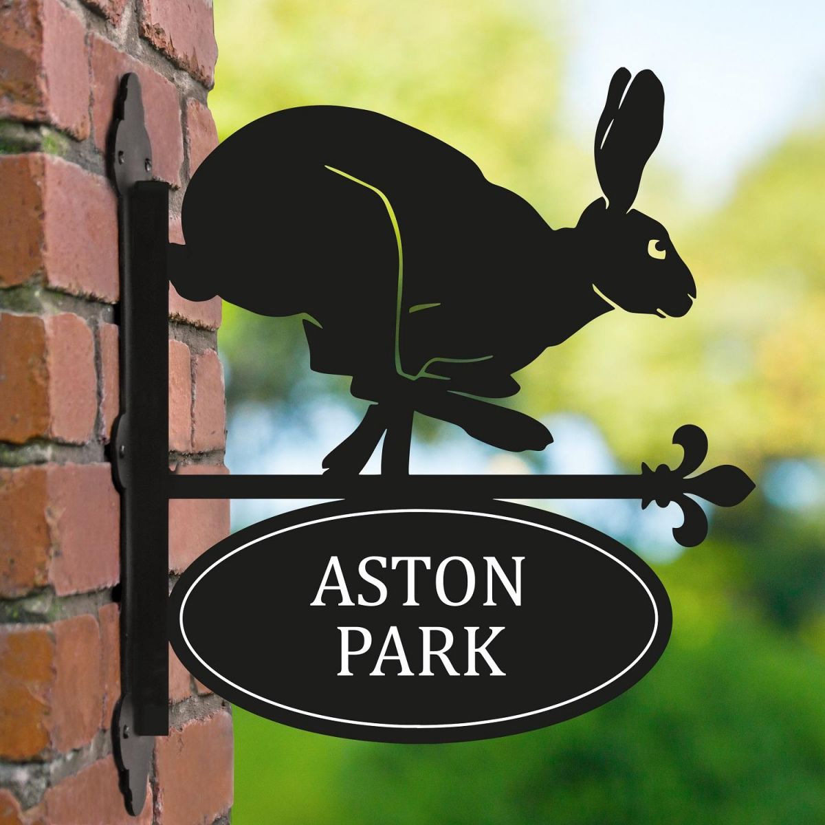 Running Hare Iron Bracketed House Name Sign in Garden