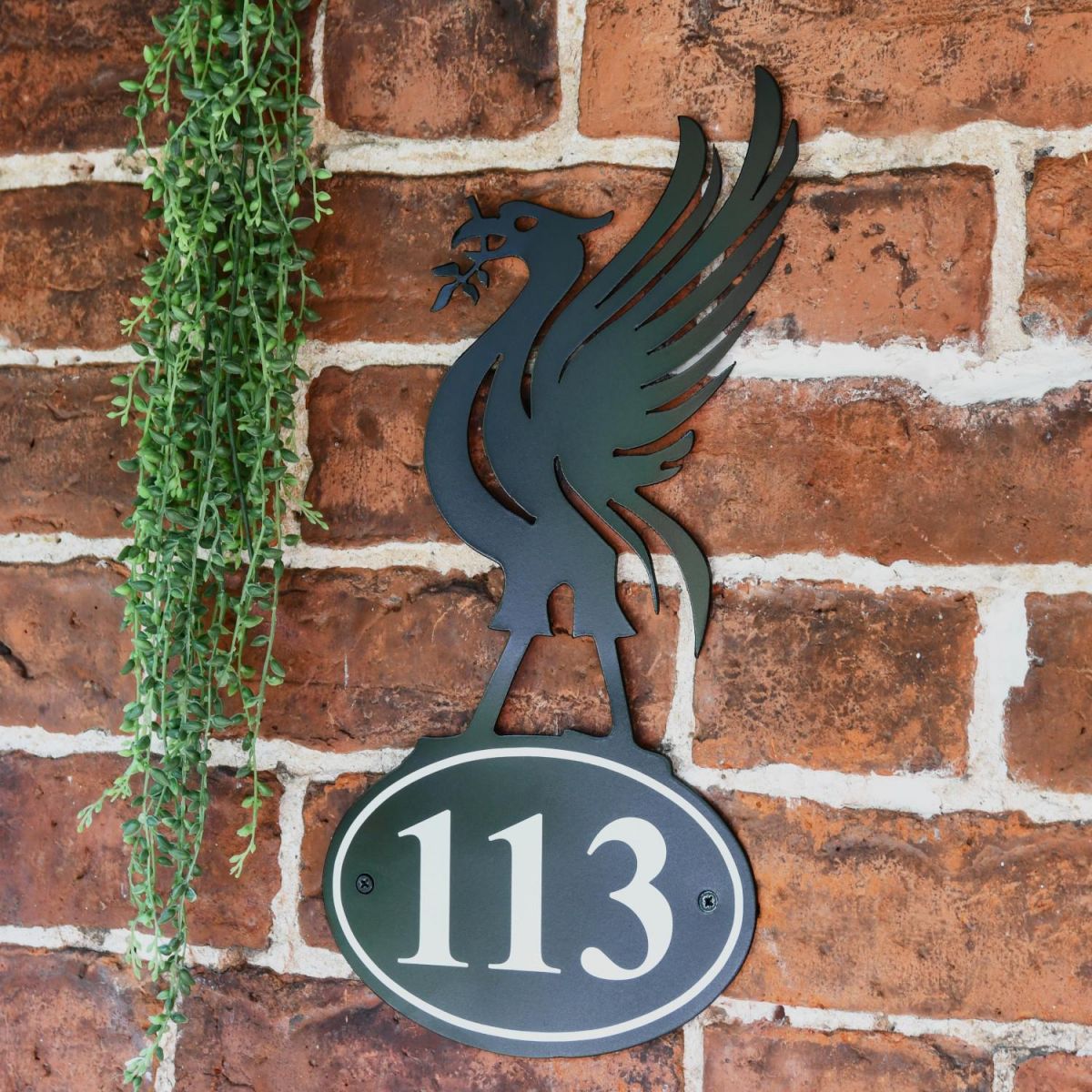 Black Liver Bird Iron House Number Sign in Situ Black Liver Bird Iron House Number Sign in Situ
