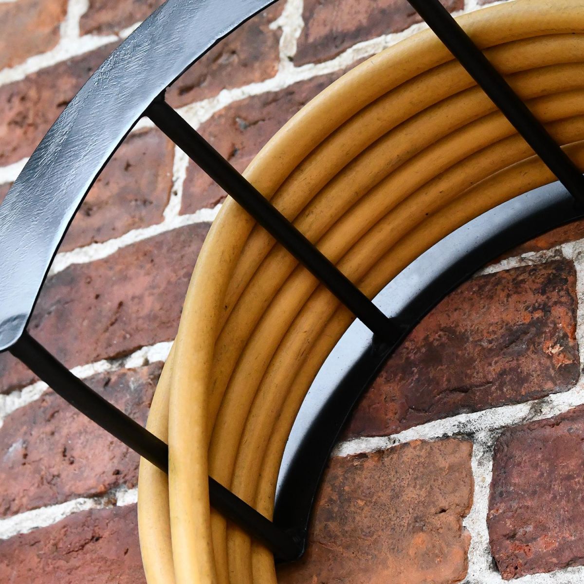 Close-up of the Wall Mounted Contemporary Cockerel Iron Hose Holder