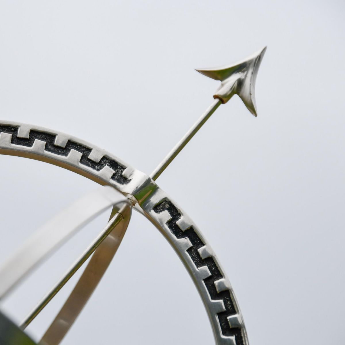 Close-Up of Arrow Tip on Polished Chrome "Almwick Manor" Armillary - 37cm