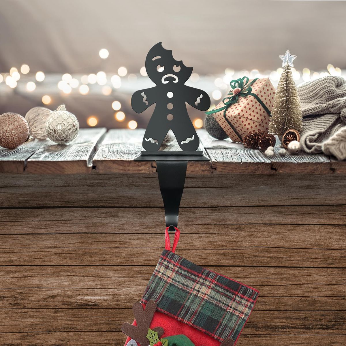 Bitten Gingerbread Man Stocking Holder in Situ Holding a Stocking