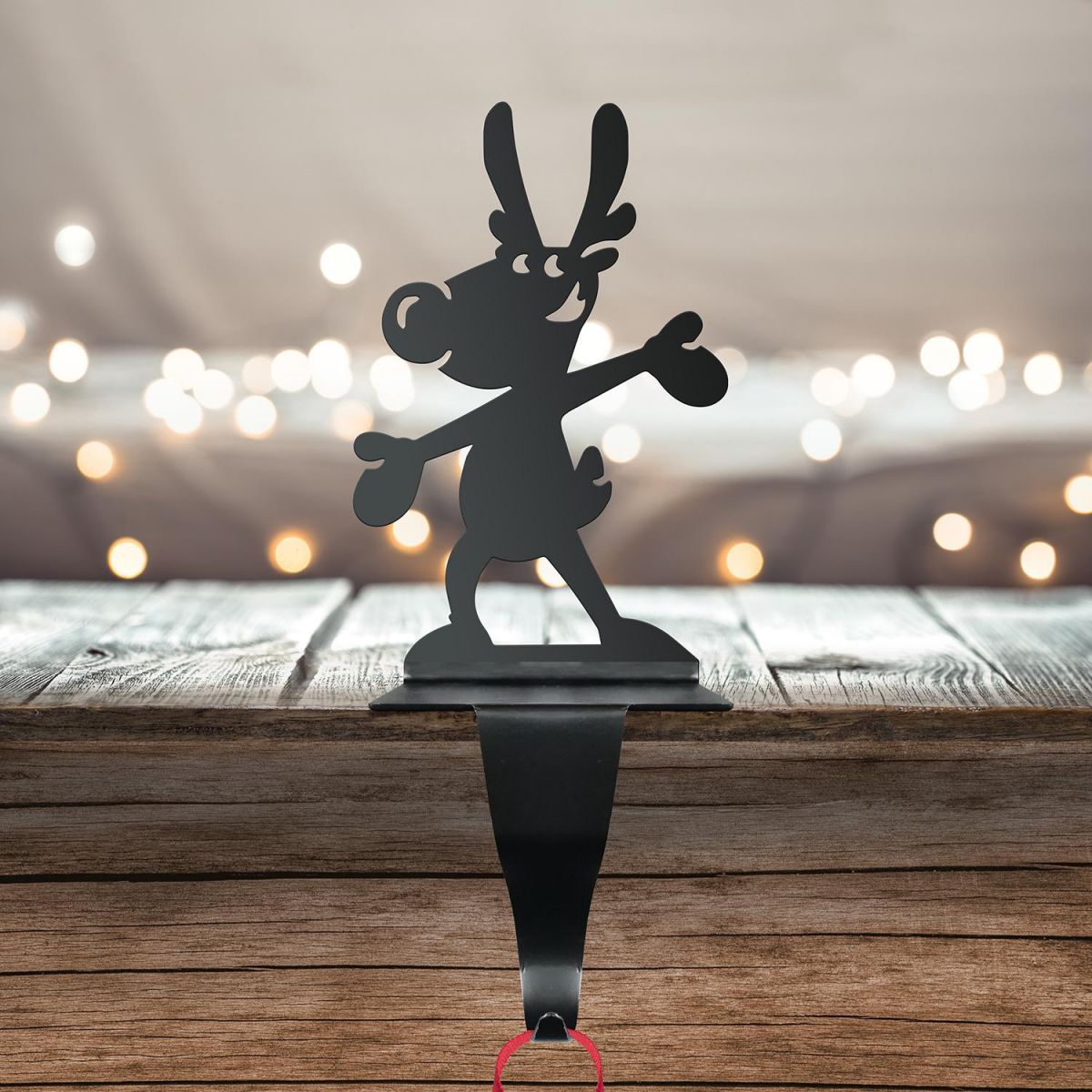 Reindeer Stocking Holder in Situ on a Mantel Piece Reindeer Stocking Holder in Situ on a Mantel Piece