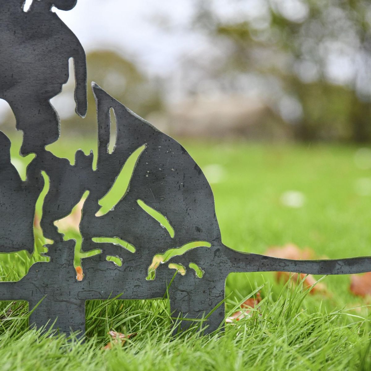 Close up of unfinished metal garden silhouette 