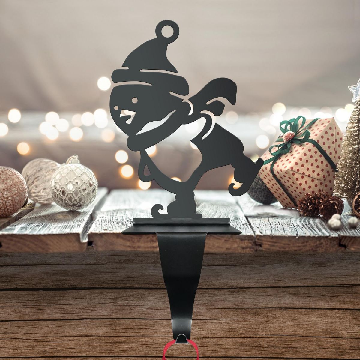 Black Stocking Holder with Penguin on Skates Black Stocking Holder with Penguin on Skates