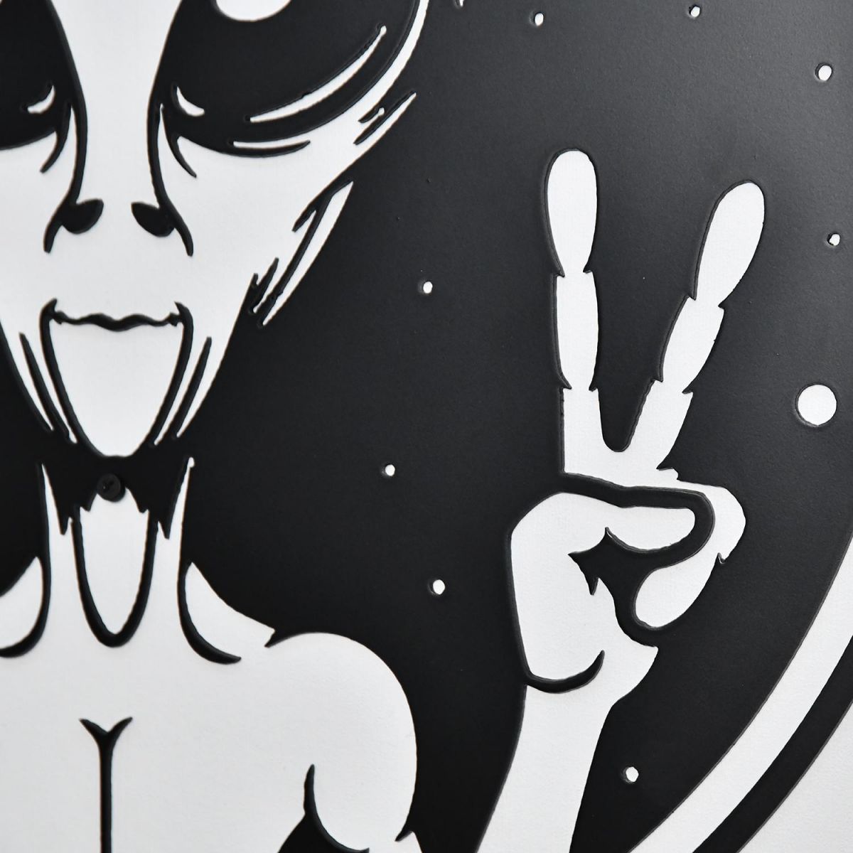 Close-up of the Peace Sign Alien Wall Art