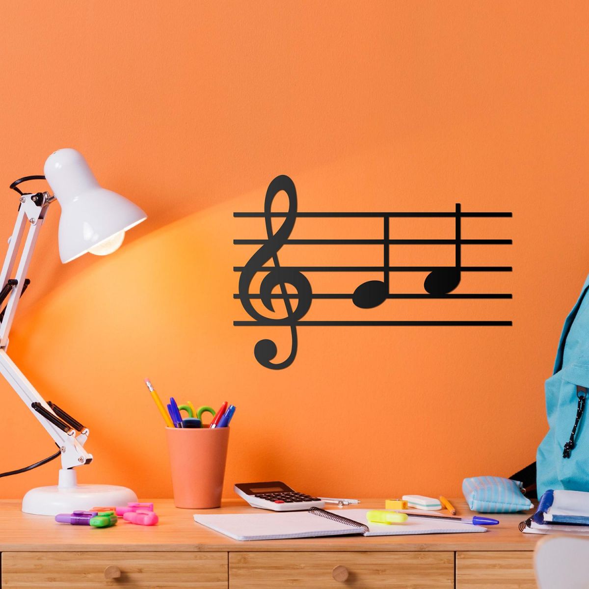 Musical Notes Steel Wall Art on an Orange Wall