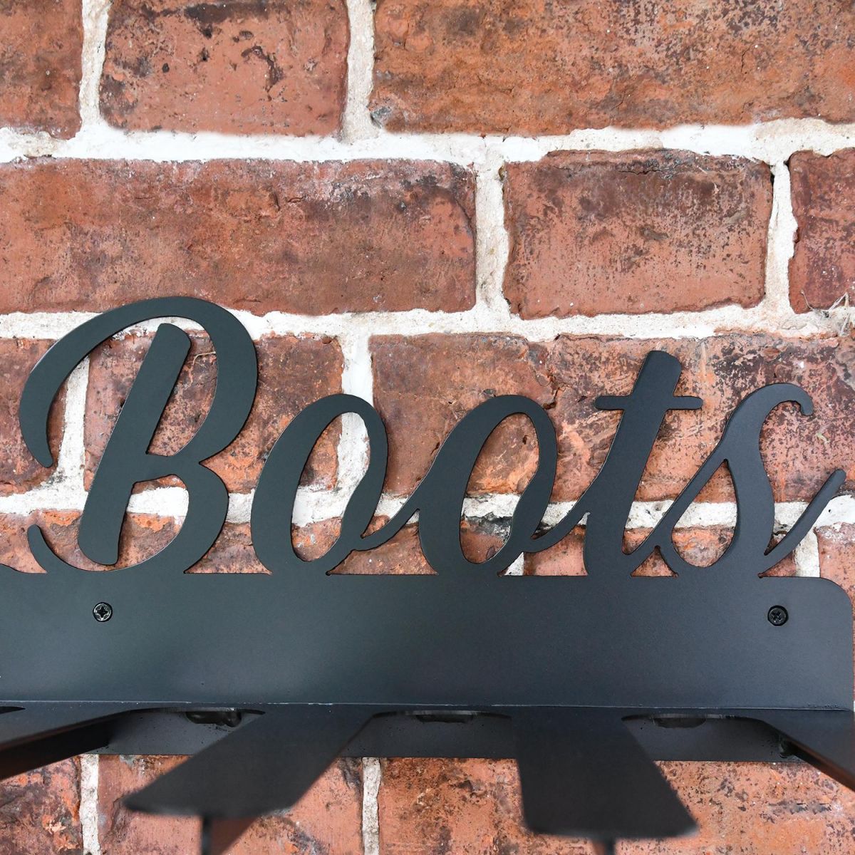 The Wording Boots on the Top of the Boot Holder