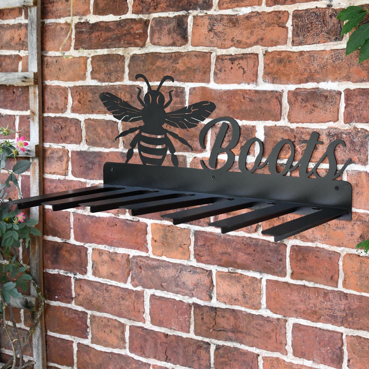 Wall Mounted Bumble Bee Iron Boot Holder Mounted on a Brick Wall