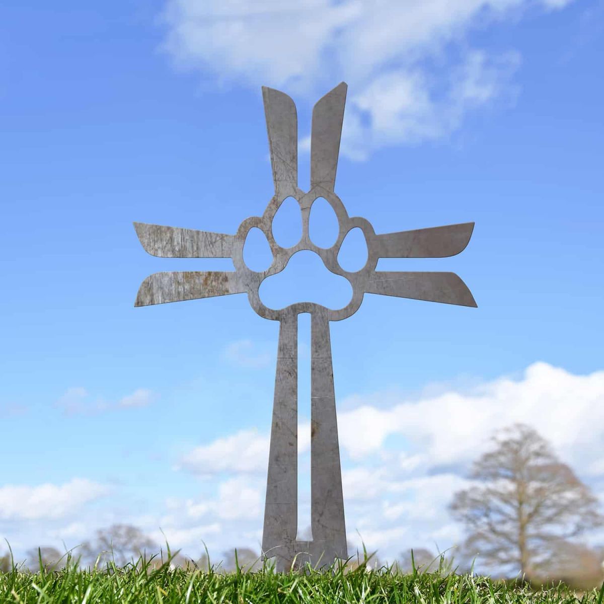 Close-Up of Unfinished Contemporary Paw Print on Cross Grave Marker Ground Spike Close-Up of Unfinished Contemporary Paw Print on Cross Grave Marker Ground Spike