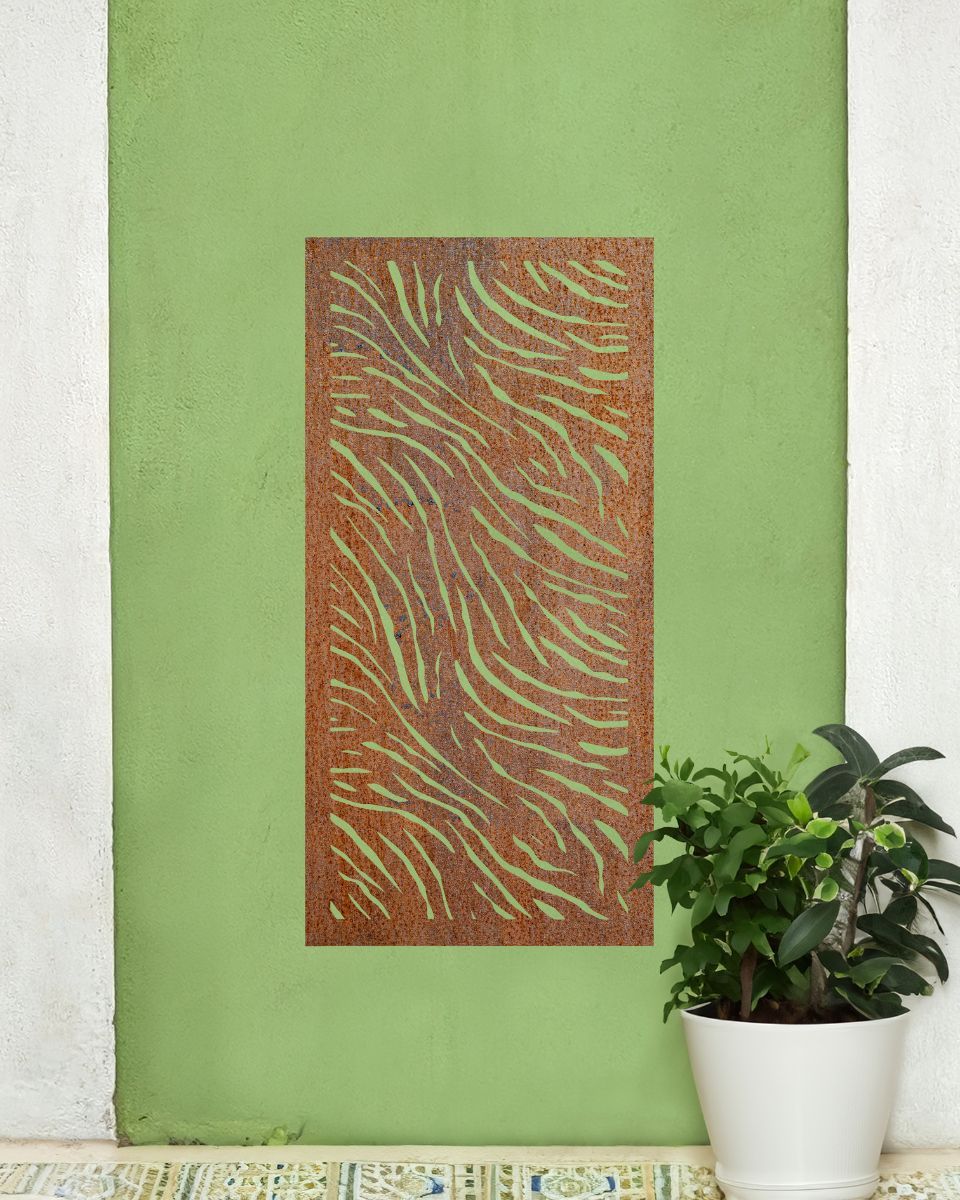 "Rust Finish Zebra print Garden Wall Art" mounted on a green wall next to a house plant "Rust Finish Zebra print Garden Wall Art" mounted on a green wall next to a house plant