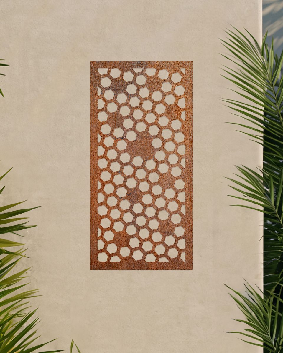 Rustic" Honeycomb Pattern Wall Art" on a beige garden wall surrounded by palm leaves Rustic" Honeycomb Pattern Wall Art" on a beige garden wall surrounded by palm leaves