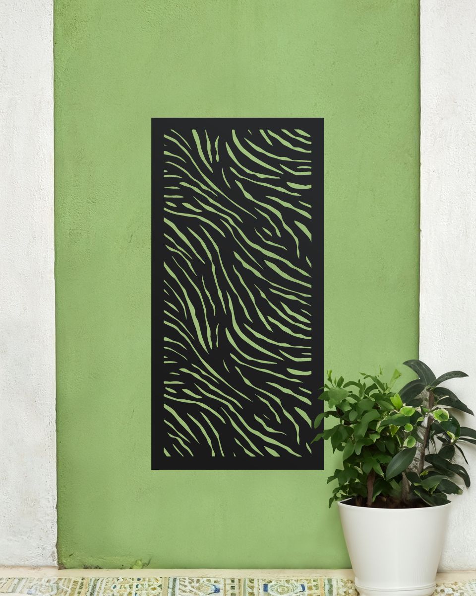"Black Zebra Print Garden Wall Art" on a green wall next to house plant