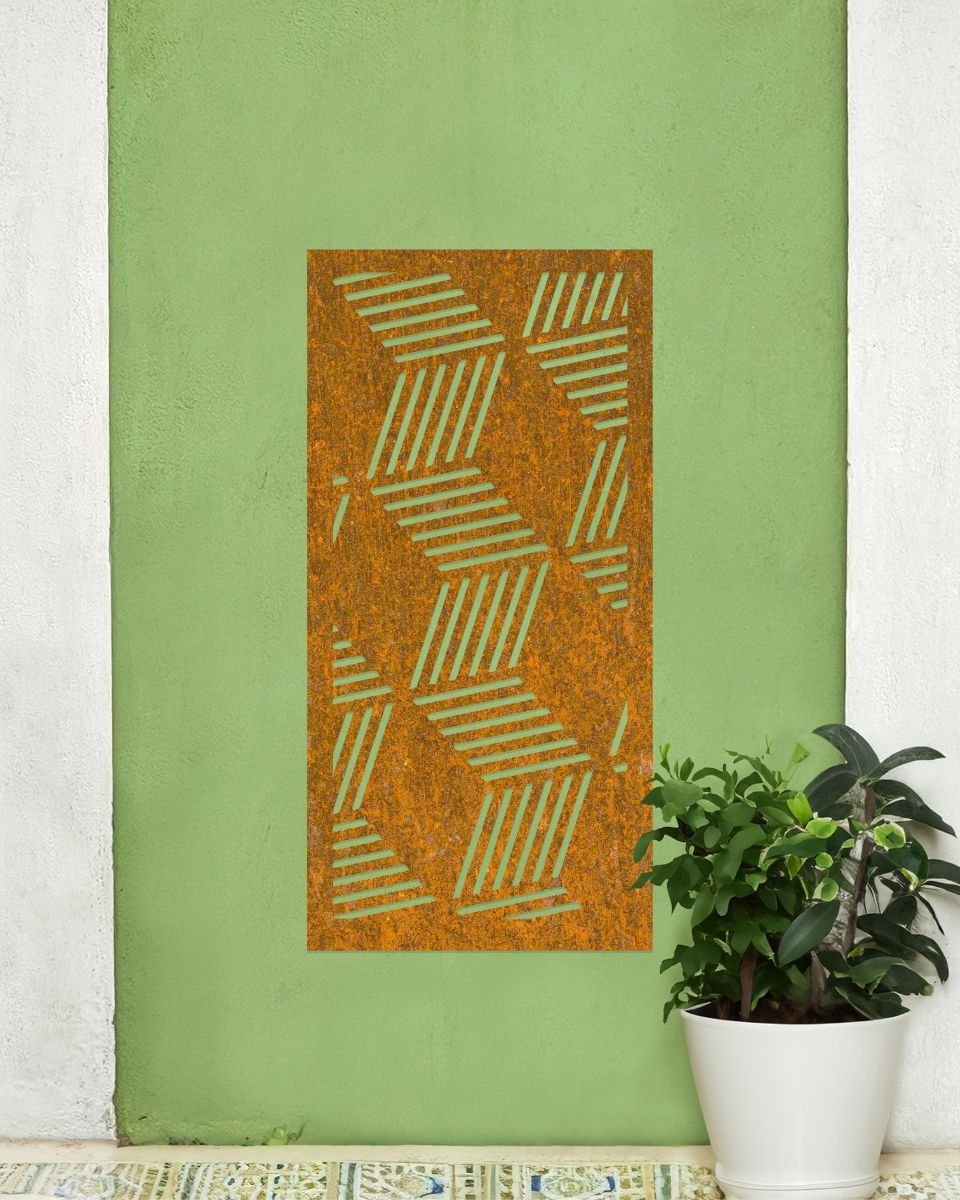 Rustic "Geometric Cube Wall Art" on a green wall next to a potted plant Rustic "Geometric Cube Wall Art" on a green wall next to a potted plant