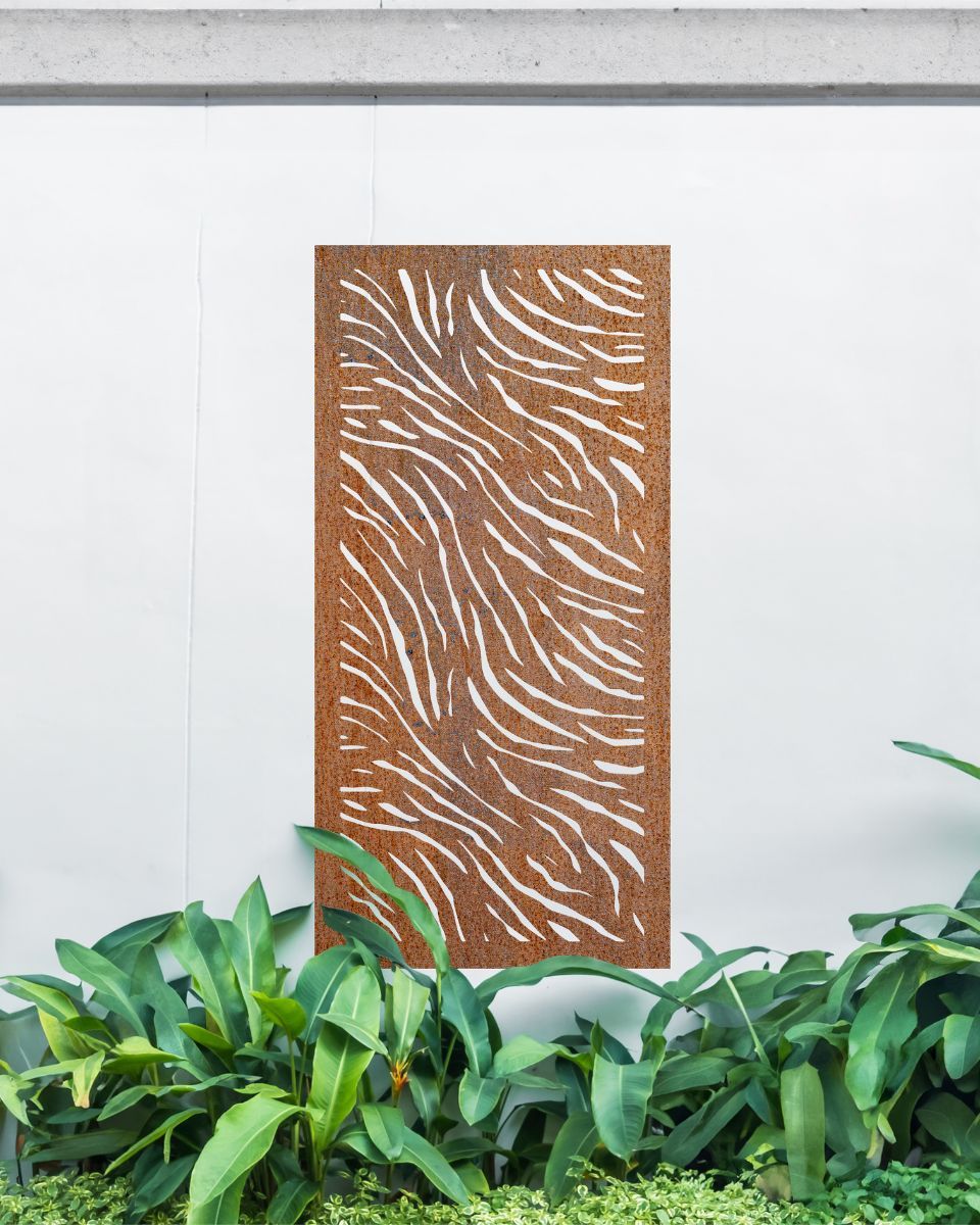 "Rust Finish Zebra print Garden Wall Art" on a white garden wall amongst garden plants "Rust Finish Zebra print Garden Wall Art" on a white garden wall amongst garden plants