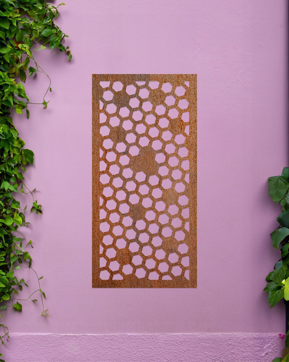 Rustic" Honeycomb Pattern Wall Art" on a purple garden wall  Rustic" Honeycomb Pattern Wall Art" on a purple garden wall