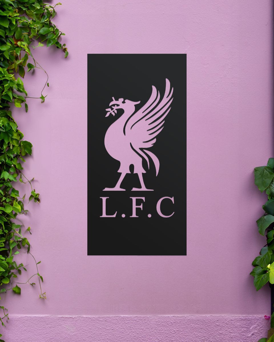 Black "Liver Bird Wall Art" mounted on a purple garden wall Black "Liver Bird Wall Art" mounted on a purple garden wall