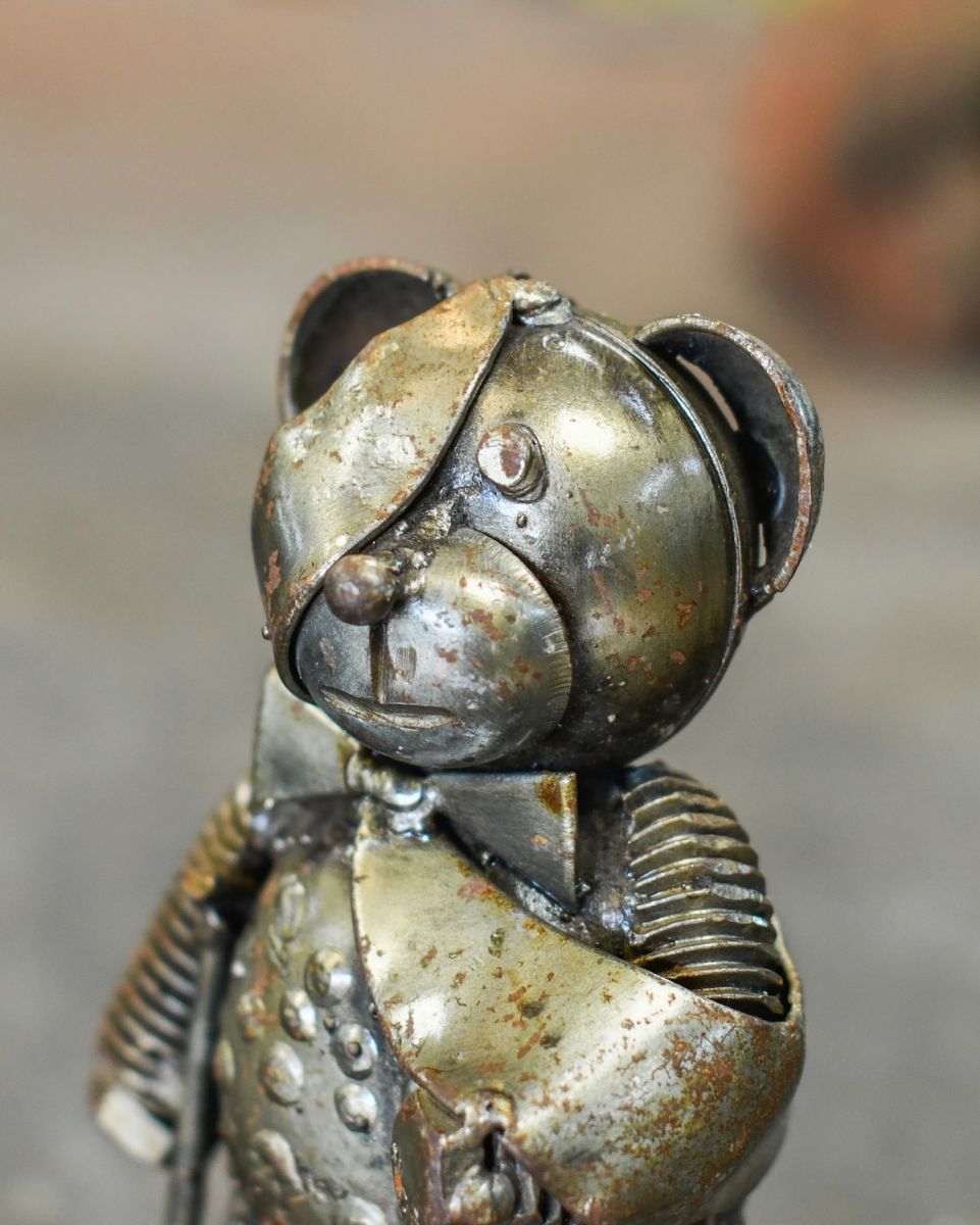 Close up of face detail on scrap metal bear sculpture