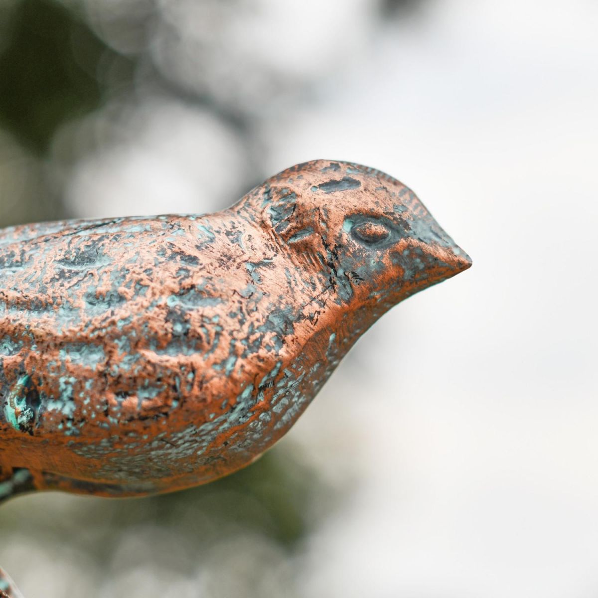 Close-Up of Bird Sculpture in Verdigris Finish Close-Up of Bird Sculpture in Verdigris Finish