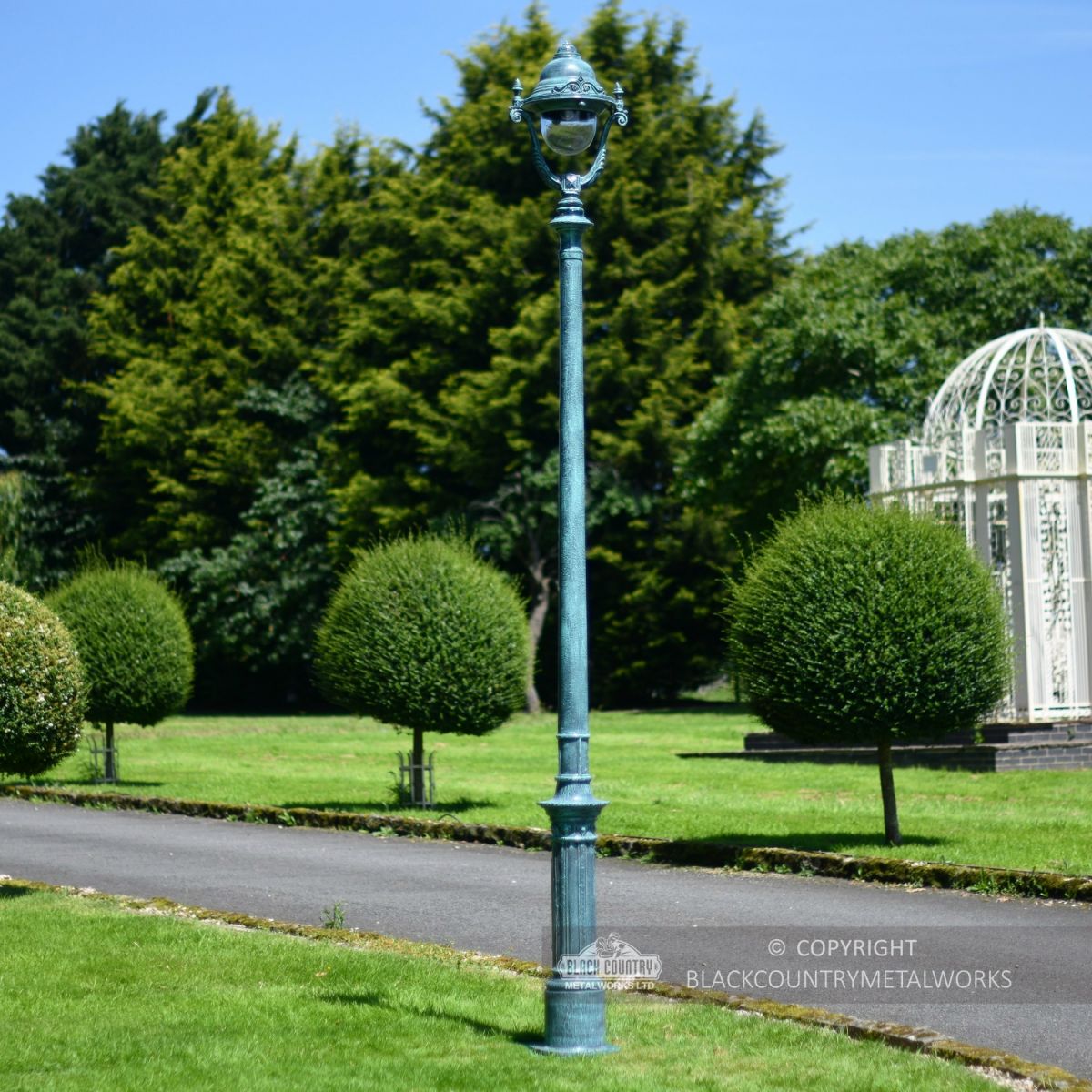 Verdigris Green Cast Iron Lamp Post Column In Garden Setting