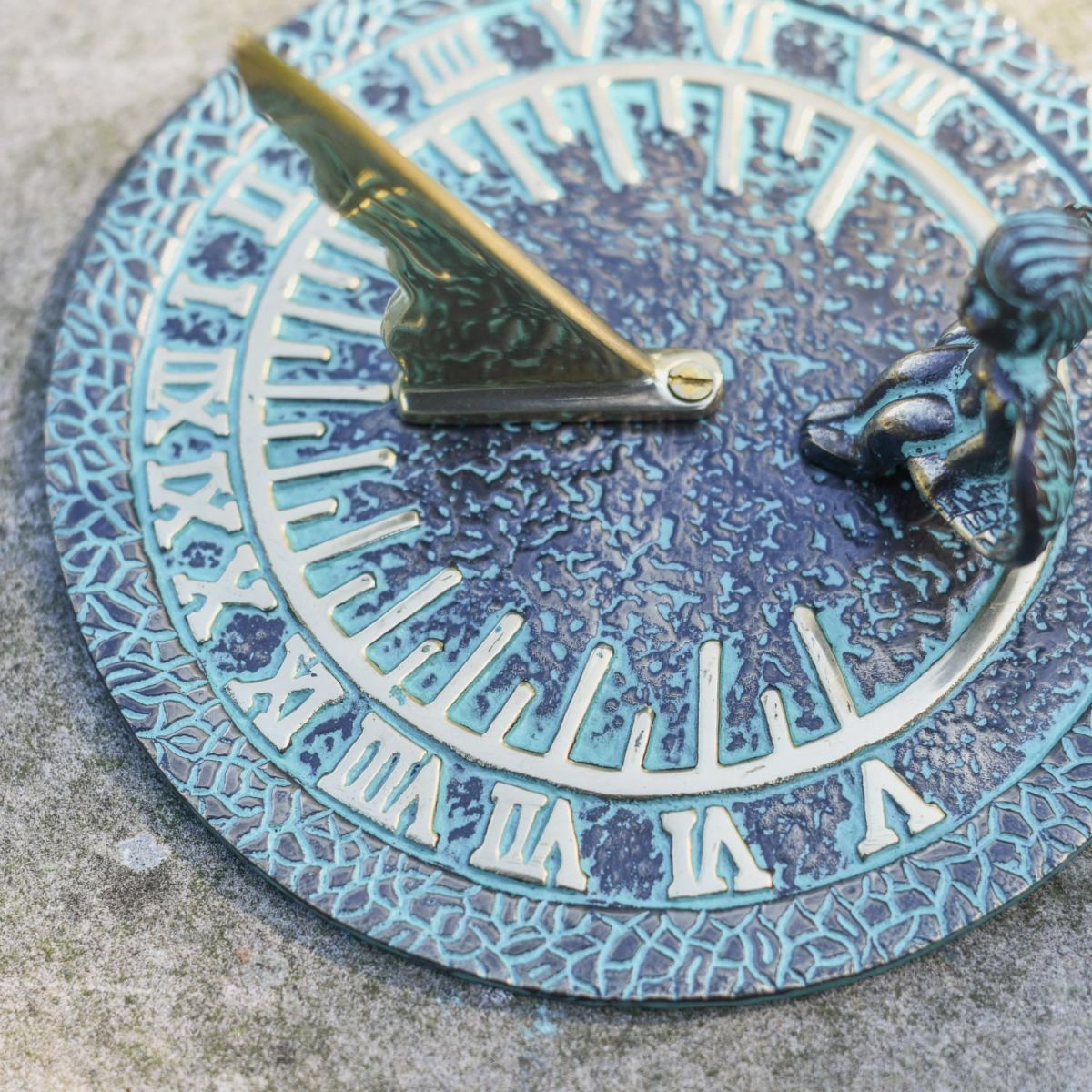 Close-Up of Roman Numerals Fixed to Verdigris Sundial Close-Up of Roman Numerals Fixed to Verdigris Sundial