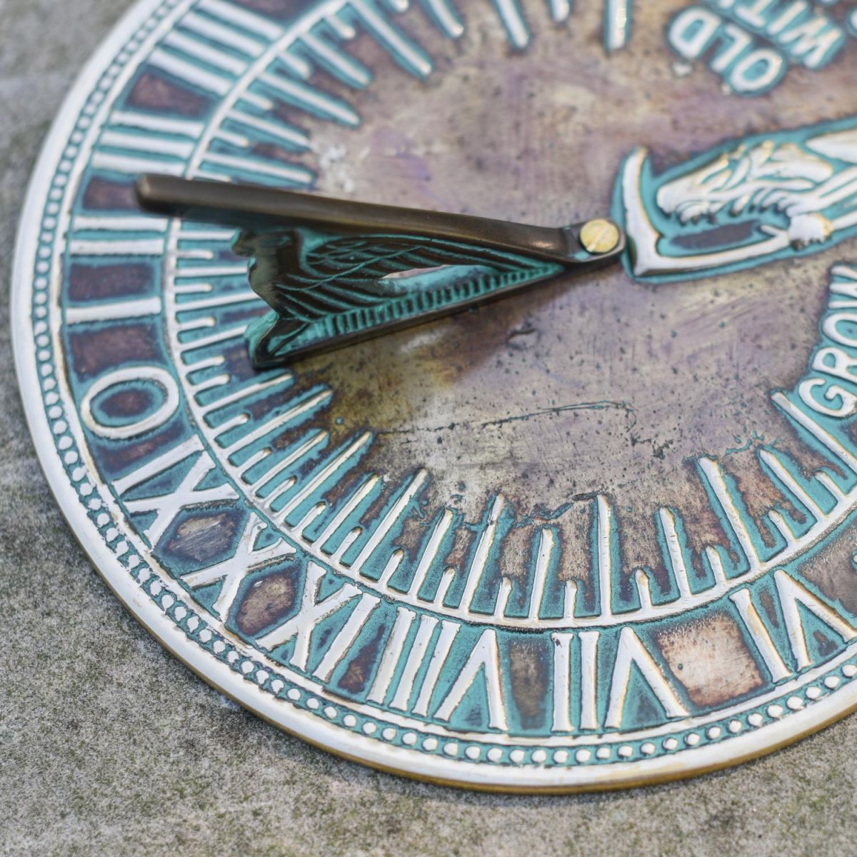 Close-Up of Roma Numerals on Verdigris "Old Father Time" Sundial
