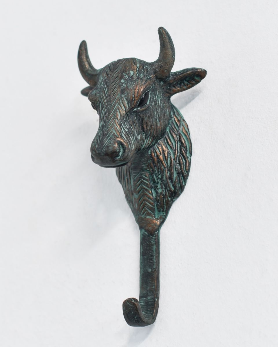 Front view of verdigris bull head coat hook Front view of verdigris bull head coat hook