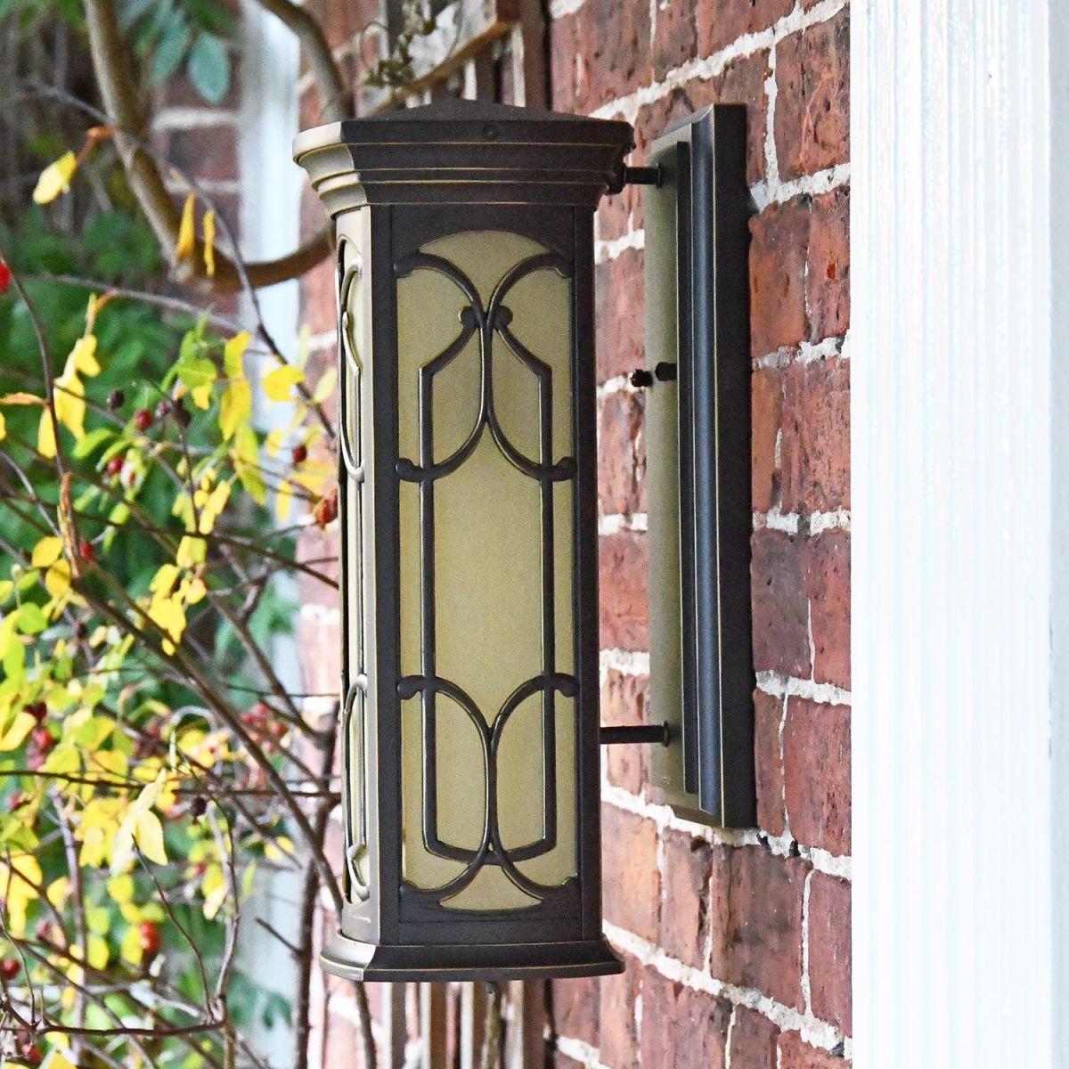 the"Verona" Traditional Outdoor Bronze Wall Lantern Mounted Flush on a Brick Wall