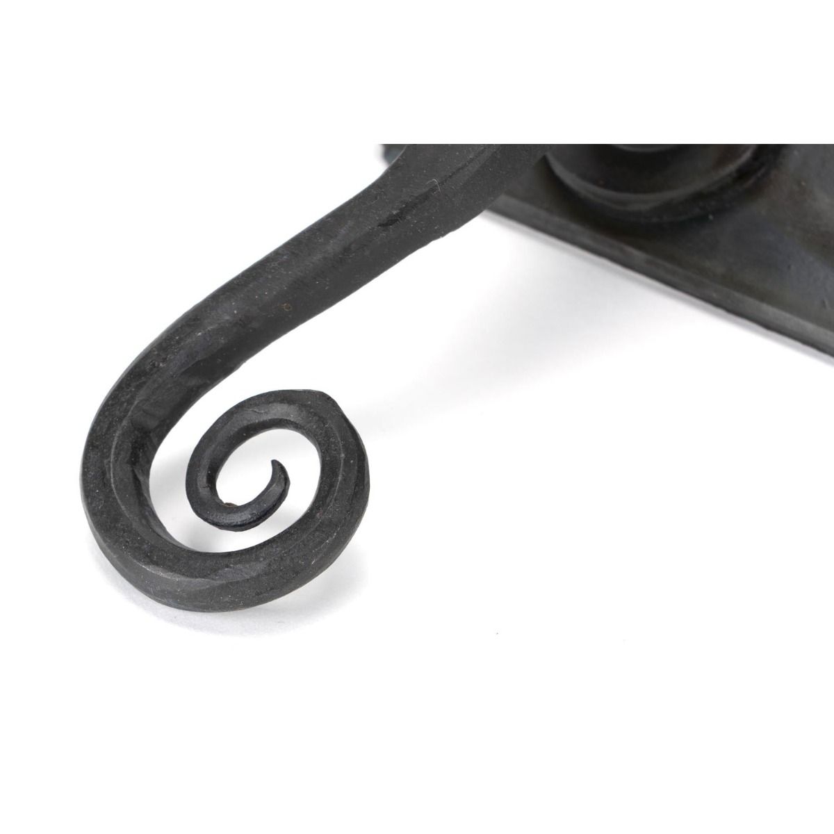 Ververt Beeswax Monkeytail Lever Handle Set with Key Hole Showing a Close up of the Curled Handle