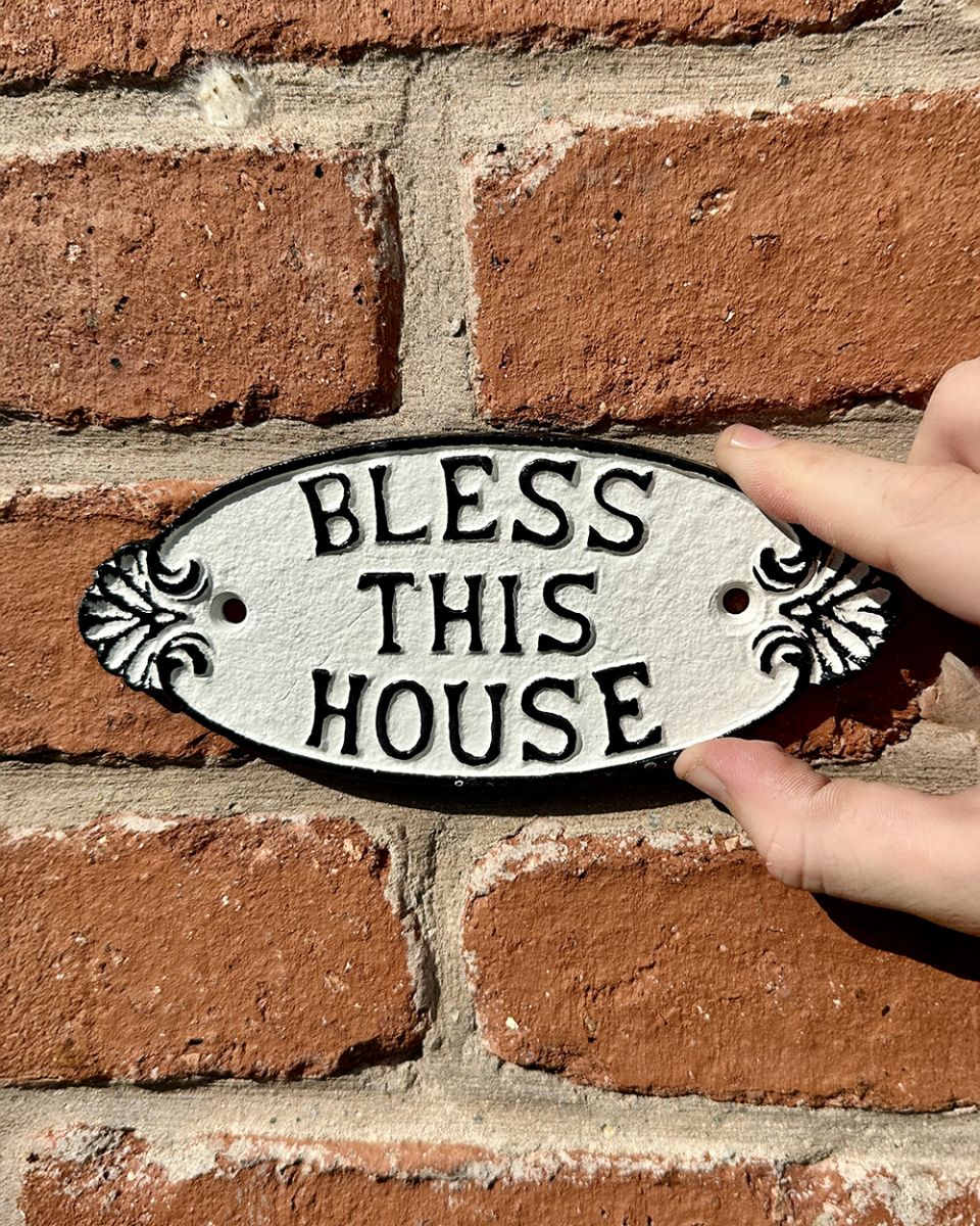 Cast iron bless this house sign
