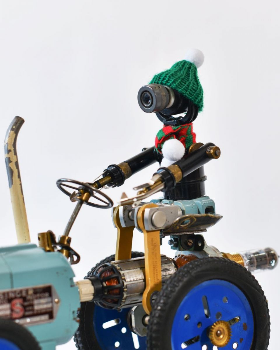 Close up of Vintage Farmer Recycled Metal Sculpture driver Close up of Vintage Farmer Recycled Metal Sculpture driver