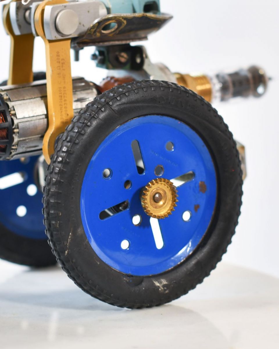 Close up of Vintage Farmer Recycled Metal Sculpture Wheel Close up of Vintage Farmer Recycled Metal Sculpture Wheel