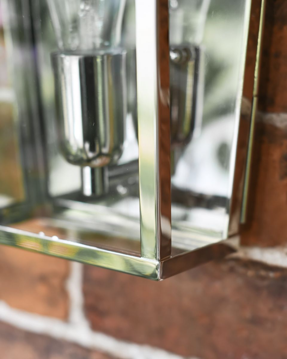 Close up of nickel detail on garden wall light Close up of nickel detail on garden wall light