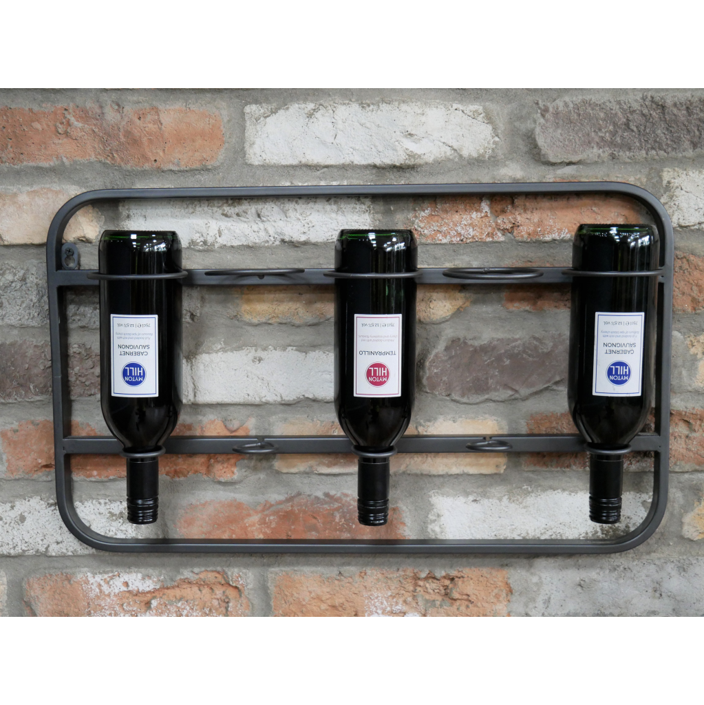 Wall Mounted Steel Wine Rack in Situ on a Brick Wall Wall Mounted Steel Wine Rack in Situ on a Brick Wall