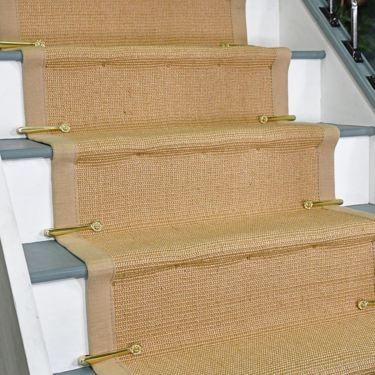 "Welling Manor Florentine" Polished Brass Stair Clips on a Stair Case