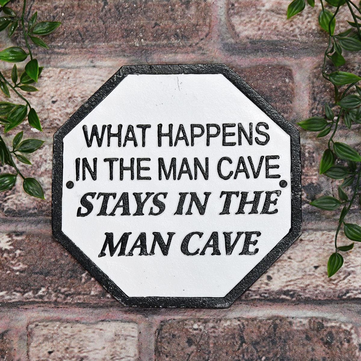 "What Happens In The Man Cave Stays In The Man Cave" Cast Iron Sign in Use Outdoors