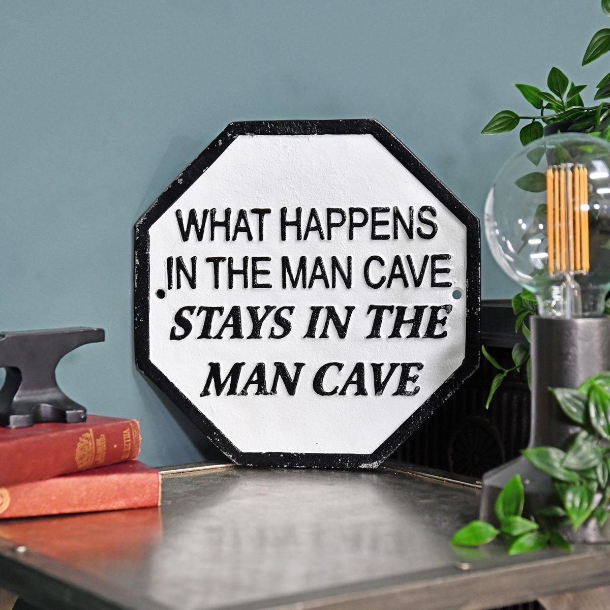 "What Happens In The Man Cave Stays In The Man Cave" Cast Iron Sign in Situ